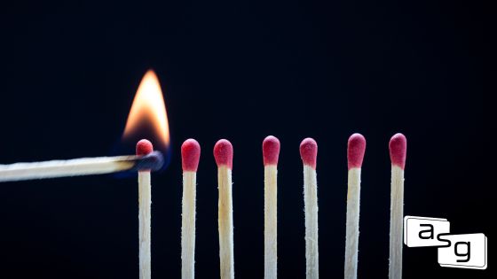 A visually striking representation of sales enablement, featuring a line of matches being skillfully lit, symbolizing the ignition of strategic and powerful sales practices.