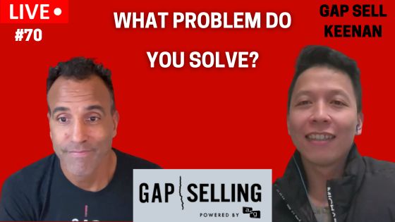 Two sellers engaged in a discussion, emphasizing the significance of knowing the answer to 'What problems do you solve for your clients?' in strategic sales.