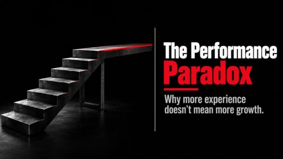 Industrial staircase rising into a flat plateau beside “The Performance Paradox,” illustrating why experienced sales reps plateau despite gaining more experience.